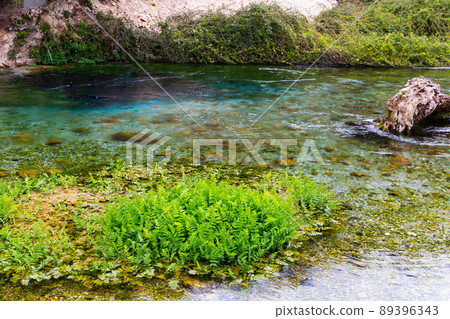 Natural landscape with clear emerald water of Blue Eye, Albania 89396343
