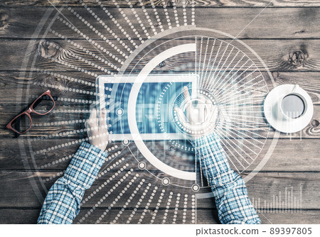 Business workplace with tablet device coffee cup and media interface Business workplace with tablet device coffee cup and media interface 89397805