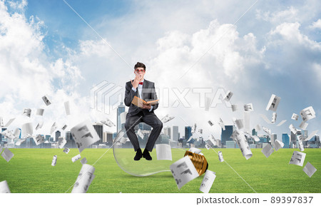 young businessman with a book young businessman with a book 89397837
