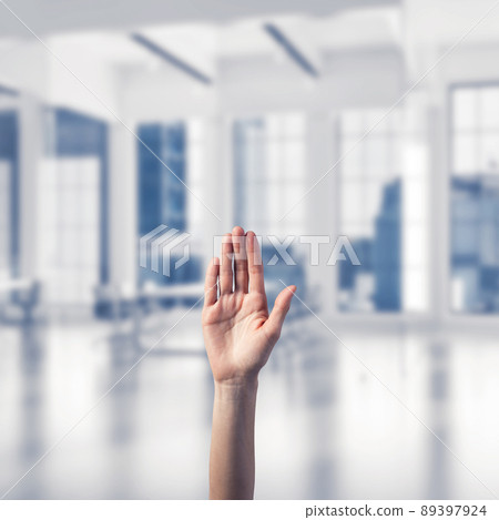Choosing gesture of person in elegant modern interior in sunshine light 89397924