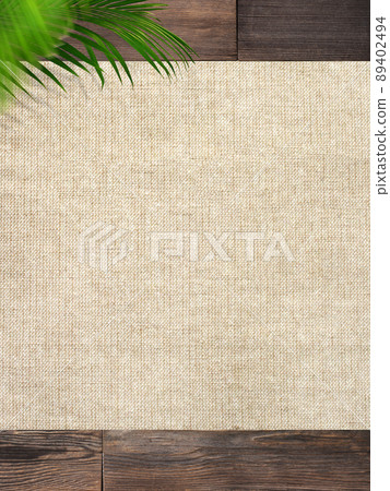 Natural background of palm leaves and wood grain Natural background of palm leaves and wood grain 89402494