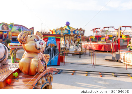 Children's rides and carousels are closed and empty Children's rides and carousels are closed and empty 89404698