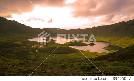 Landscape sunset view to Caldeirao crater, Corvo island, Azores, Portugal Landscape sunset view to Caldeirao crater, Corvo island, Azores, Portugal 89405067