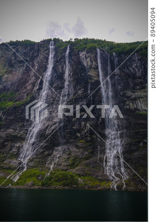 panoramic view to Seven Sisters waterfall and Geirangerfjord in Norway panoramic view to Seven Sisters waterfall and Geirangerfjord in Norway 89405094