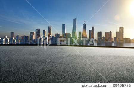 Cityscape skyline evening scene with empty asphalt floor 89406786
