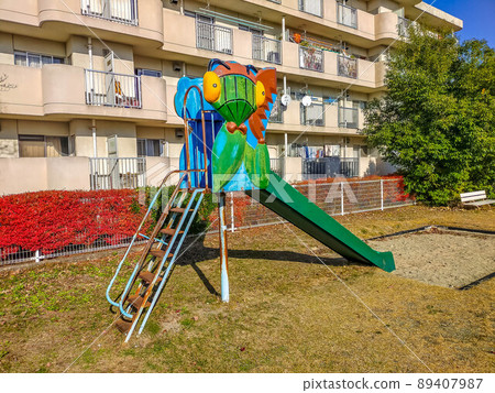A park with a mantis slide A park with a mantis slide 89407987
