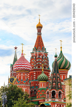 St. Basil's Cathedral and Spasskaya tower of Kremlin on Red Square in Moscow, Russia St. Basil's Cathedral and Spasskaya tower of Kremlin on Red Square in Moscow, Russia 89409040