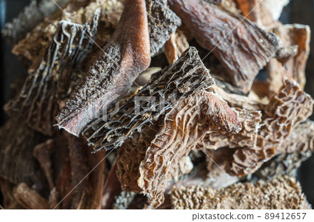 Pet Treats. Dried beef tripe.Pieces of natural, wholesome chewable dog treats. Pet Treats. Dried beef tripe.Pieces of natural, wholesome chewable dog treats. 89412657