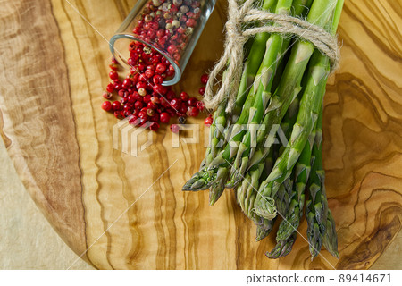 Fresh Young Asparagus closeup. Asparagus on wood board Fresh Young Asparagus closeup. Asparagus on wood board 89414671