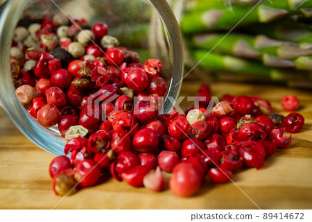 Red pepper peas with asparagus on wood board. Peas pepper. Red pepper close - up background 89414672