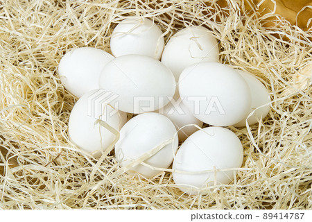 Chiken white eggs close up. farm chicken ecologic eggs Chiken white eggs close up. farm chicken ecologic eggs 89414787