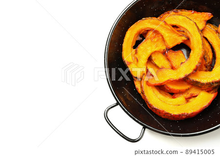 Bowl with baked pumpkin isolated on white background Bowl with baked pumpkin isolated on white background 89415005