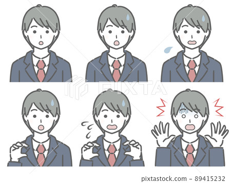 A young man in a suit with a surprising expression A young man in a suit with a surprising expression 89415232