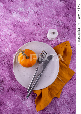 Table setting on lilac concrete background Table setting on lilac concrete background 89416169