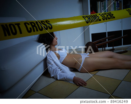 Crime Scene - Woman dead lying on the floor 89416249