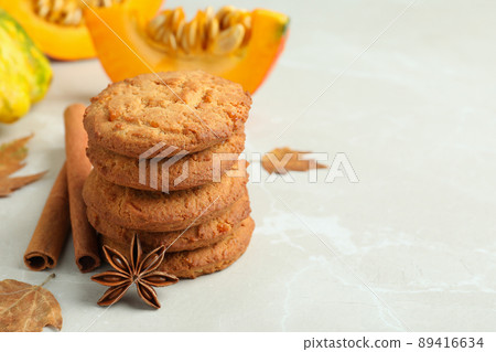Pumpkin cookies on white textured background, space for text Pumpkin cookies on white textured background, space for text 89416634