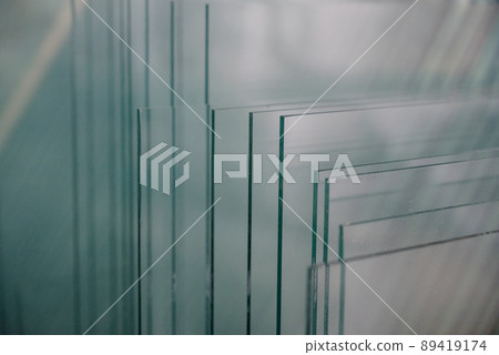 A lot of glass panes in one place. Glass factory. A lot of glass panes in one place. Glass factory. 89419174