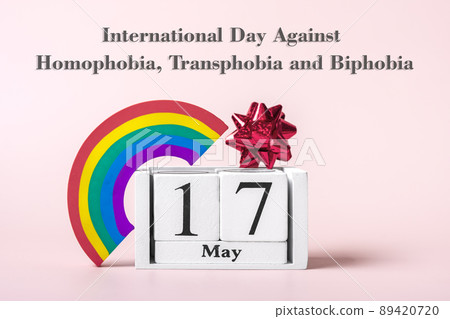 Rainbow LGBT symbol, calendar isolated on pink background 17 May - International Day Against Homophobia, Transphobia and Biphobia concept Greeting card. Rainbow LGBT symbol, calendar isolated on pink background 17 May - International Day Against Homophobia, Transphobia and Biphobia concept Greeting card. 89420720