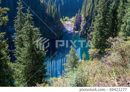 Kaindy lake - mountain lake in Kazakhstan Kaindy lake - mountain lake in Kazakhstan 89421277