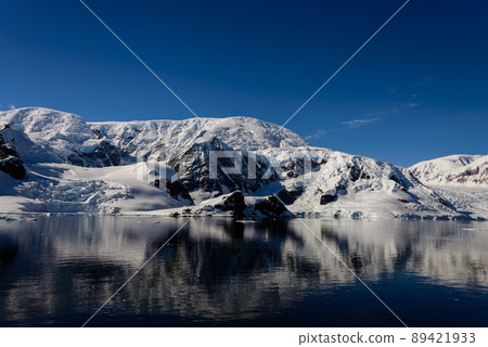 Antarctic beach with glacier and mountains, view from expedition ship 89421933