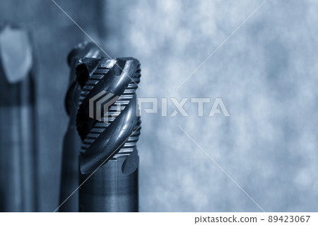 Close-up scene the used rough cutter solid carbide endmill tools for CNC milling machine . 89423067