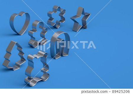 Set of metal cookie cutters for homemade Christmas biscuit on a white background 89425206