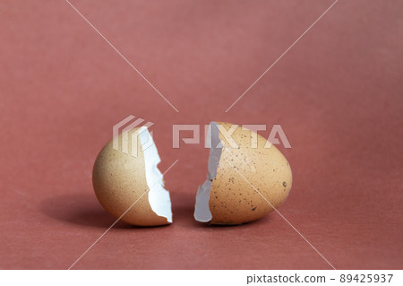 broken egg shell on brown background with space for text broken egg shell on brown background with space for text 89425937