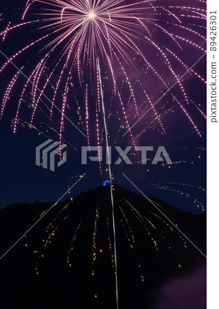 Fireworks of Gifu Castle and Nagara River illuminated in blue Fireworks of Gifu Castle and Nagara River illuminated in blue 89426301