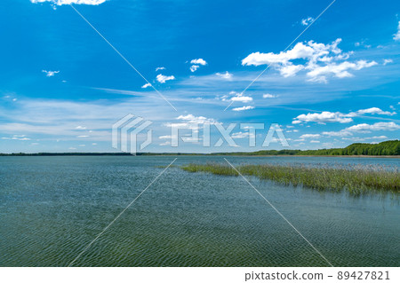 Panoramic view on Sniardwy lake in Masuria region (Mazury), Poland. Panoramic view on Sniardwy lake in Masuria region (Mazury), Poland. 89427821