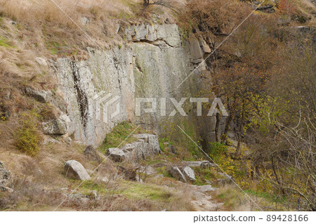 Granite rocks of Bukski Canyon in autumn. Picturesque landscape and beautiful place in Ukraine 89428166