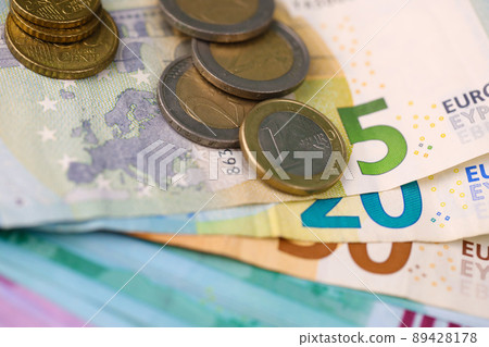 Euro money bills and coins close up. Big amount of euro money on table. Business and budget Euro money bills and coins close up. Big amount of euro money on table. Business and budget 89428178