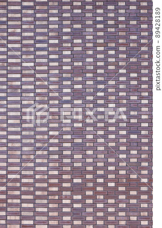 Dark brick wall pattern with chaotic masonry order. Background texture or resource for 3d texturing. Many bricks in big modern stone wall Dark brick wall pattern with chaotic masonry order. Background texture or resource for 3d texturing. Many bricks in big modern stone wall 89428189