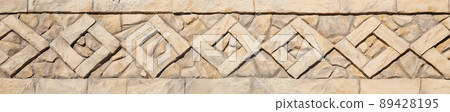 pattern yellow color of ancient style design decorative uneven cracked real stone wall surface with cement. Old sacred tomb facade with sunlight pattern yellow color of ancient style design decorative uneven cracked real stone wall surface with cement. Old sacred tomb facade with sunlight 89428195