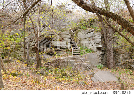 Granite rocks of Bukski Canyon in autumn. Picturesque landscape and beautiful place in Ukraine Granite rocks of Bukski Canyon in autumn. Picturesque landscape and beautiful place in Ukraine 89428236