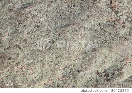 Closeup of the rough stone texture of a big rock surface for natural background concepts. Closeup dirty natural stone background texture Closeup of the rough stone texture of a big rock surface for natural background concepts. Closeup dirty natural stone background texture 89428253