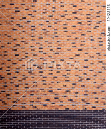 Dark brick wall pattern with chaotic masonry order. Background texture or resource for 3d texturing. Many bricks in big modern stone wall Dark brick wall pattern with chaotic masonry order. Background texture or resource for 3d texturing. Many bricks in big modern stone wall 89428368