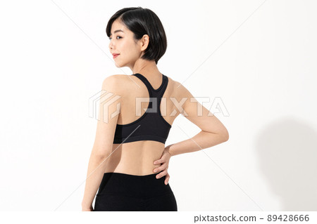 Portrait of a woman wearing sportswear Portrait of a woman wearing sportswear 89428666
