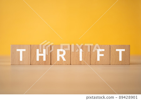 Image of frugality and savings | Building blocks with "THRIFT" written on them 89428901