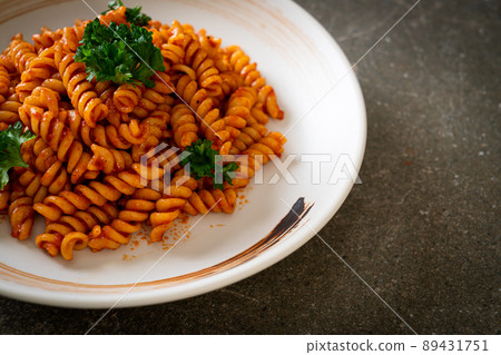 spirali or spiral pasta with tomato sauce spirali or spiral pasta with tomato sauce 89431751