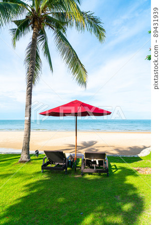 Umbrella and chair  with sea ocean view in hotel resort 89431939
