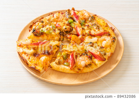seafood pizza on wood tray seafood pizza on wood tray 89432086