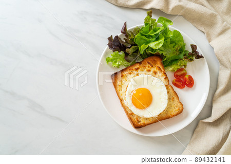 bread toasted with cheese and fried egg bread toasted with cheese and fried egg 89432141