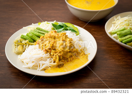 Thai Rice Noodles with Crab Curry and Variety Vegetables Thai Rice Noodles with Crab Curry and Variety Vegetables 89432321