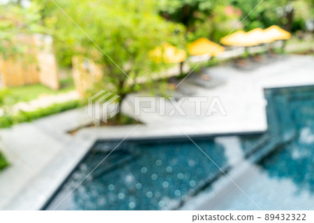 umbrella and pool bed around swimming pool umbrella and pool bed around swimming pool 89432322