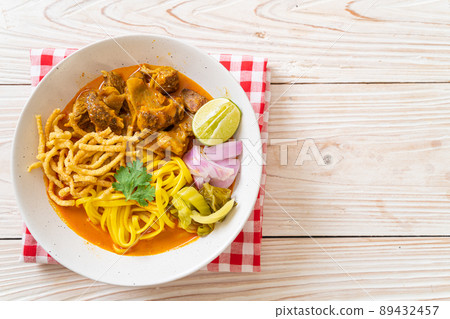Northern Thai noodle curry soup with braised pork Northern Thai noodle curry soup with braised pork 89432457
