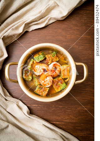 Sour soup made of Tamarind Paste with Shrimps and Vegetable Omelet Sour soup made of Tamarind Paste with Shrimps and Vegetable Omelet 89432474