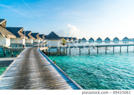 Beautiful tropical Maldives resort hotel and island with beach and sea 89433061