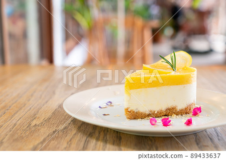 lemon cheese cake on plate 89433637