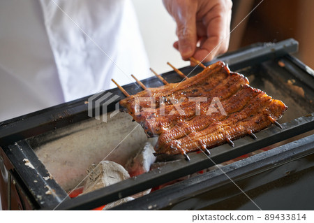 Grill eel kabayaki over charcoal 89433814