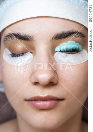 Caucasian woman on eyelash lamination procedure. Before and after. Caucasian woman on eyelash lamination procedure. Before and after. 89434722
